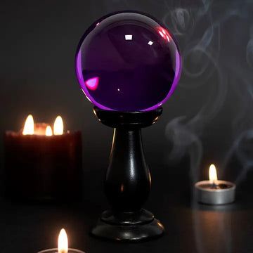 Boule de cristal violette et support