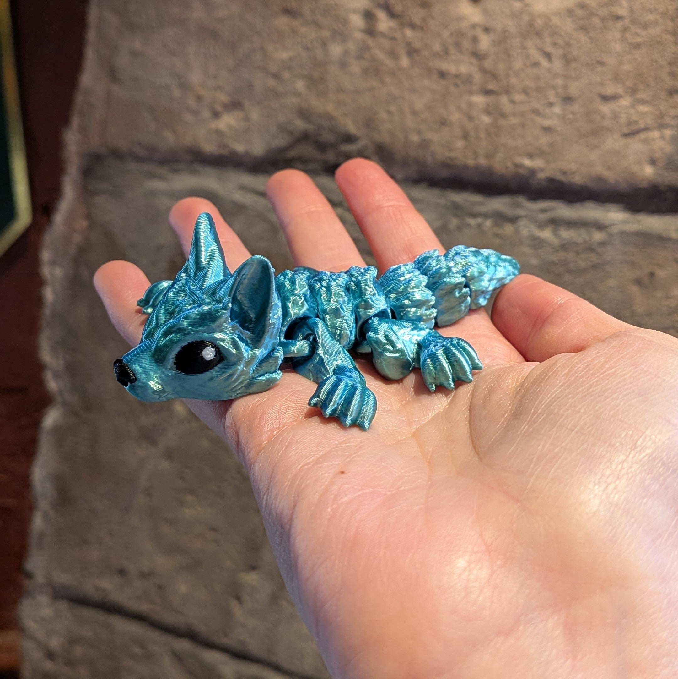 Bébé loup turquoise