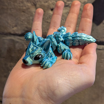 Bébé loup turquoise