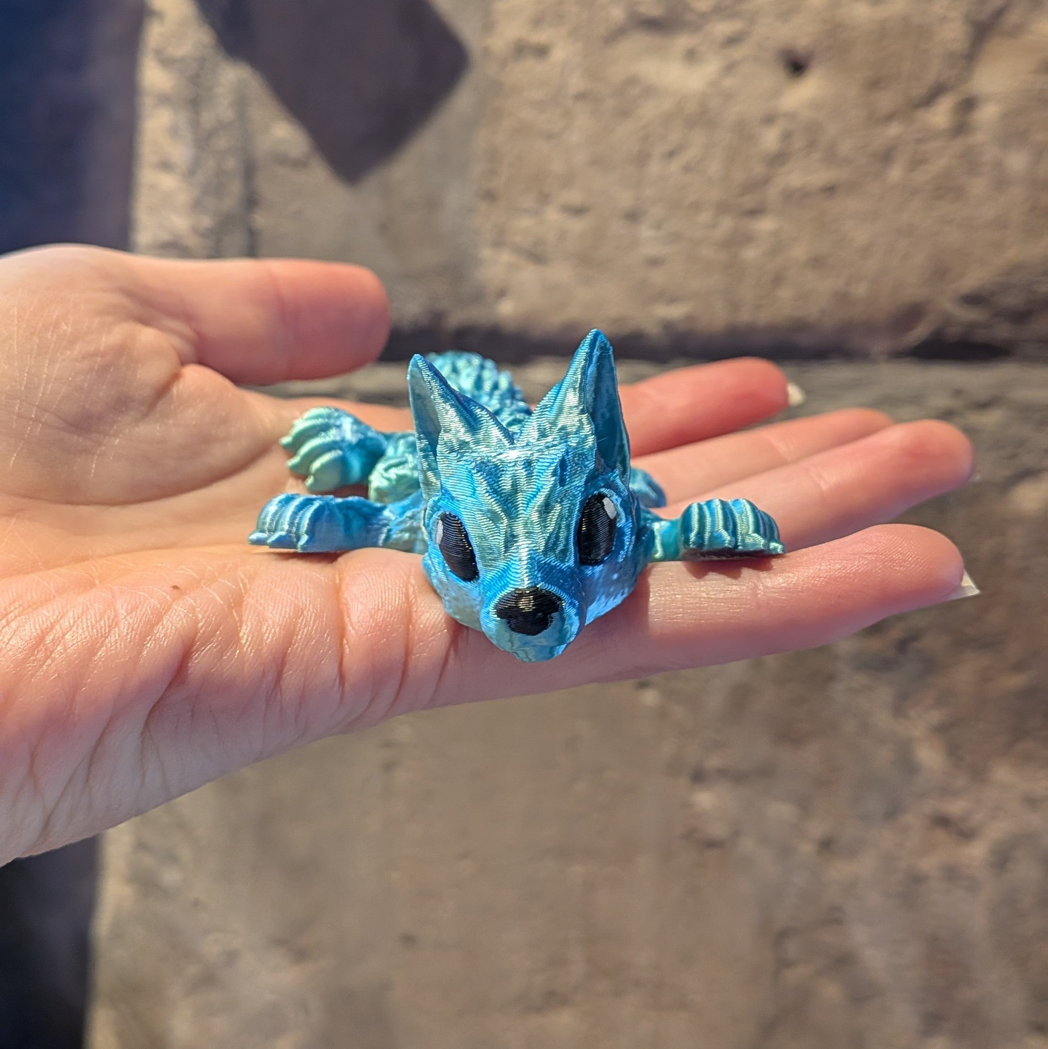 Bébé loup turquoise