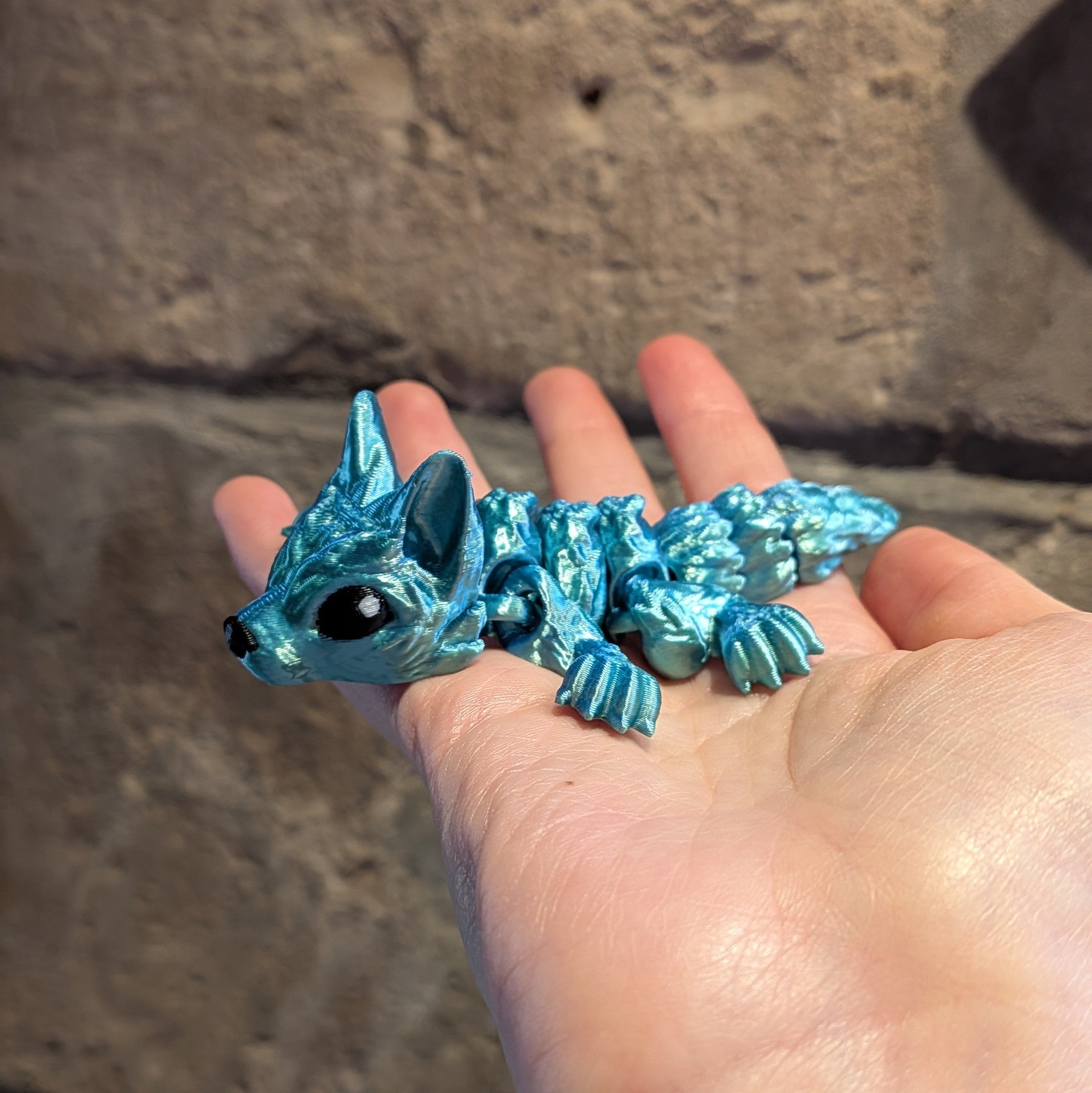 Bébé loup turquoise